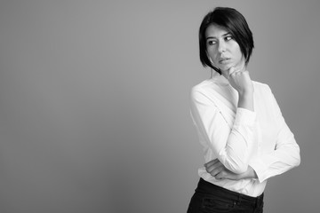 Portrait of young beautiful businesswoman shot in black and white