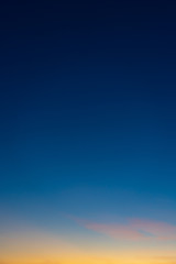 Colorful clear sky with no clouds at dusk after sunset.