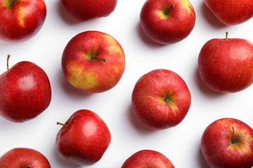 Ripe juicy red apples on white background, top view