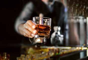 Bartender Serve Whiskey, on wood bar
