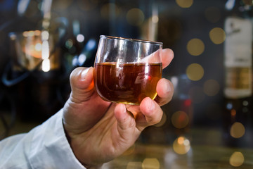 Bartender Serve Whiskey, on wood bar, 