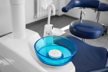 Clean spit sink in modern dentist's office