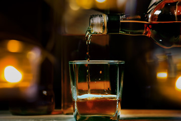 Bartender Serve Whiskey, on wood 