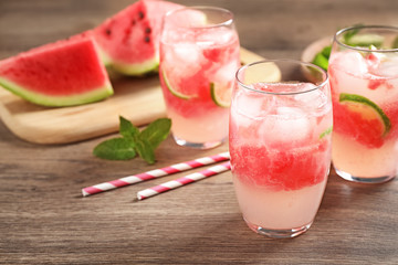 Delicious refreshing watermelon drink on wooden table