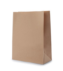 Empty craft paper bag isolated on white. Mockup for design
