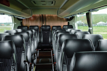 empty interior of the bus leather seats