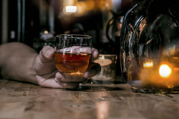 Bartender Serve Whiskey, on wood bar, 
