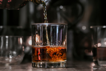 Bartender Serve Whiskey, on wood bar