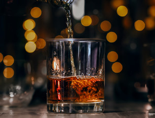 Bartender Serve Whiskey, on wood bar 