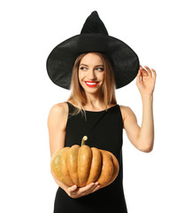 Beautiful woman wearing witch costume with pumpkin for Halloween party on white background