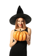 Beautiful woman wearing witch costume with pumpkin for Halloween party on white background