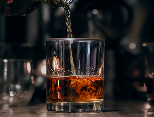 Bartender Serve Whiskey, on wood