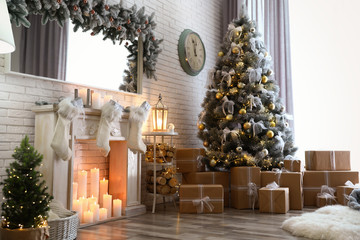 Stylish interior of living room with decorated Christmas tree