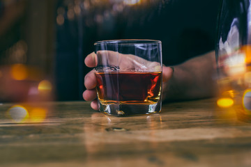 Bartender Serve Whiskey, on wood bar