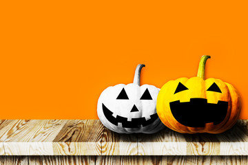 Halloween Pumpkins in a row isolated on wood background