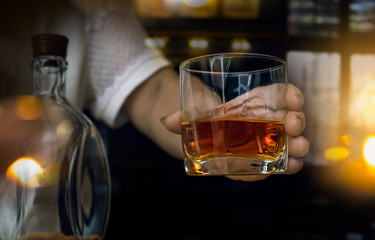 Bartender Serve Whiskey, on wood bar