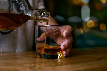 Bartender Serve Whiskey, on wood bar, 