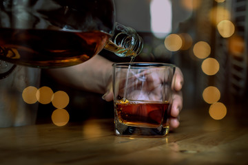 Bartender Serve Whiskey, on wood bar, 