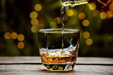 Bartender Serve Whiskey, on wood bar, 