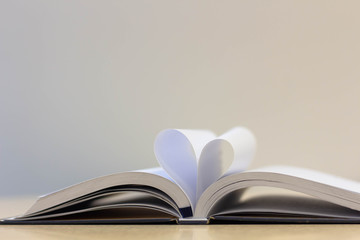 Book page in heart shape , love reading book