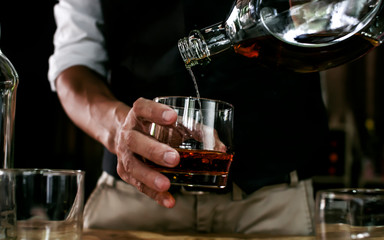 Bartender Serve Whiskey, on wood bar,