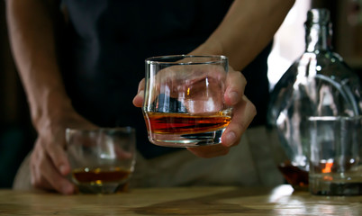 Bartender Serve Whiskey, on wood bar, 