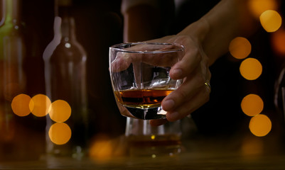 Bartender Serve Whiskey, on wood bar