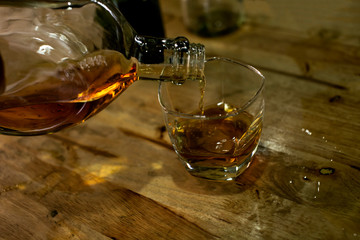 Bartender Serve Whiskey, on wood bar,