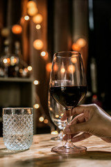 Bartender Serve wine, on wood bar, 