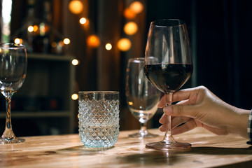 Bartender Serve wine, on wood bar, 