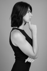 Fototapeta premium Portrait of young beautiful woman shot in black and white