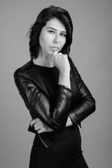 Fototapeta premium Portrait of young beautiful woman shot in black and white