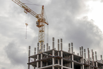 The construction of a tall frame building.