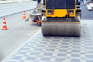 Repair of sidewalks, paths of city streets