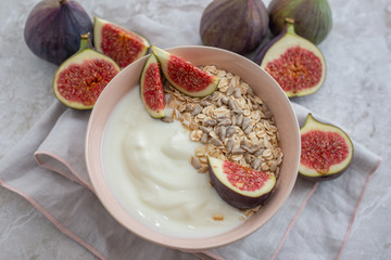 healthy yogurt with fresh figs on a table