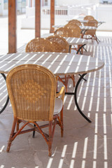Table and chairs in beach cafe next to the red sea in Sharm el Sheikh, Egypt