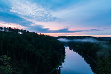 Vltava river from vantage point with fog at sunrise