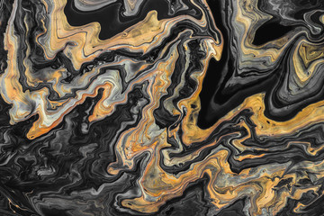 Acrylic Fluid Art. Creative marble background or texture with gold and black waves