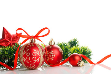 Red christmas ball with decorations on white background.
