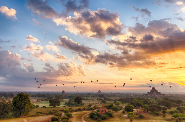 Dawn over the ancient Pagan city, Myanmar. The view from the top of Shwesandaw Temple.  View of Dhammayangyi Temple.