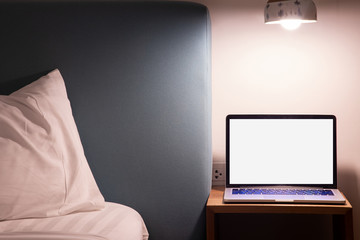 blank screen on laptopm notebook in bedroom.