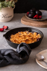 Plum crumble in cast iron