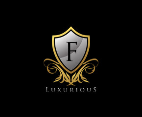 Classy Shield Letter F Gold Letter Logo Icon.