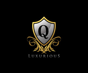 Classy Shield Letter Q Gold Letter Logo Icon.