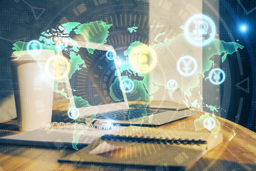 Financial market graph hologram and personal computer on background. Double exposure. Concept of forex.