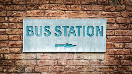 Street Sign to Bus Station