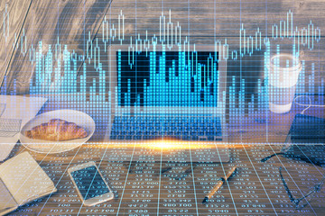 Double exposure of forex graph and work space with computer. Concept of international online trading.