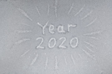Fototapeta premium inscription text 2020 year in the snow