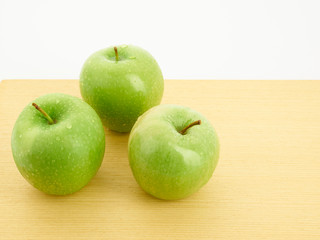 green apple on a plate