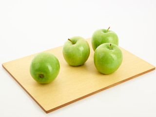 green apple on a plate